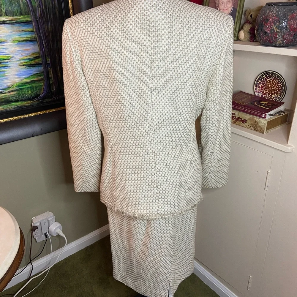Christian Dior suit size 12. Fully lined and cleaned. Excellent condition.